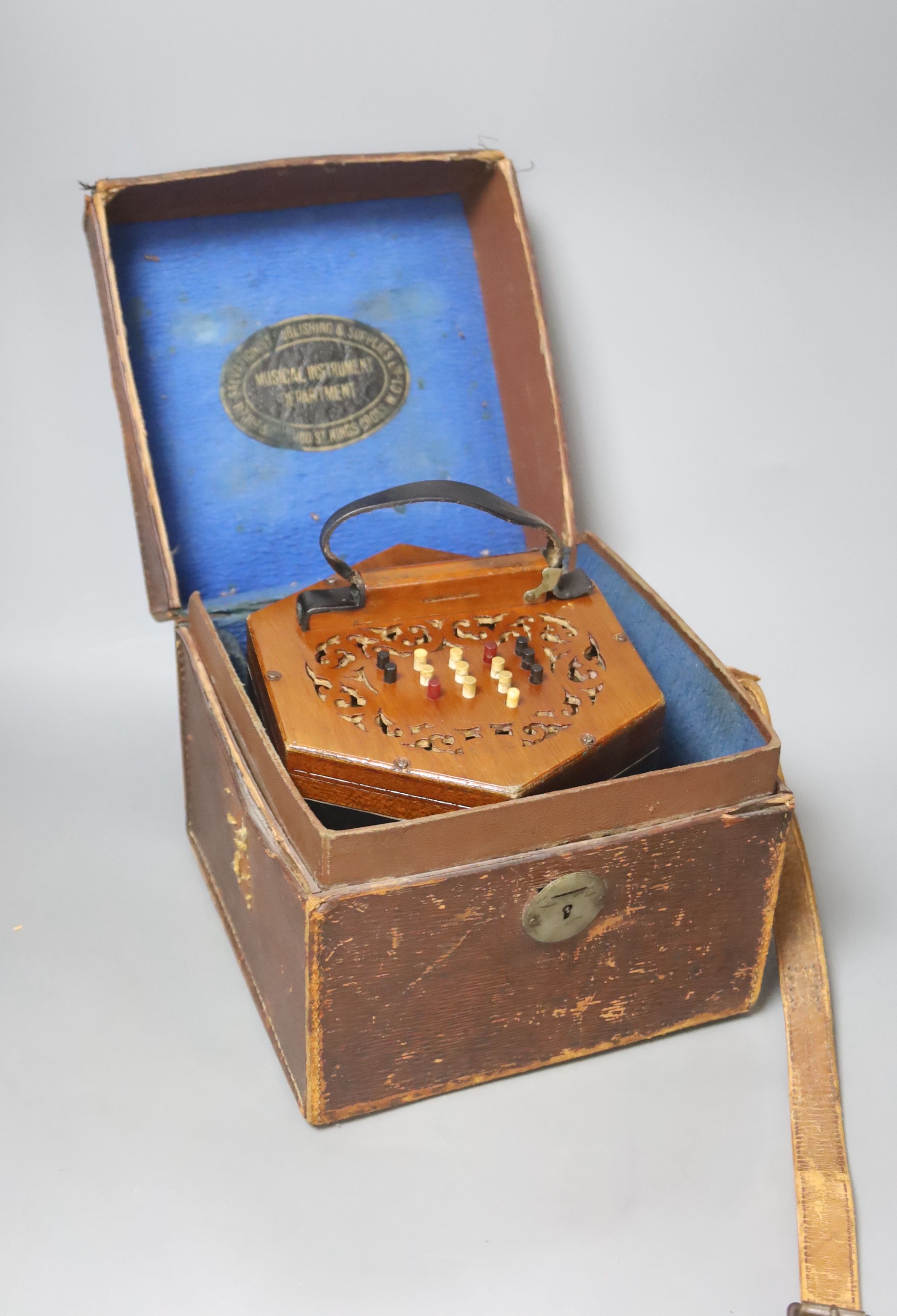 A Wheatstone Salvation Army The Triumph concertina, 34 buttons, boxed